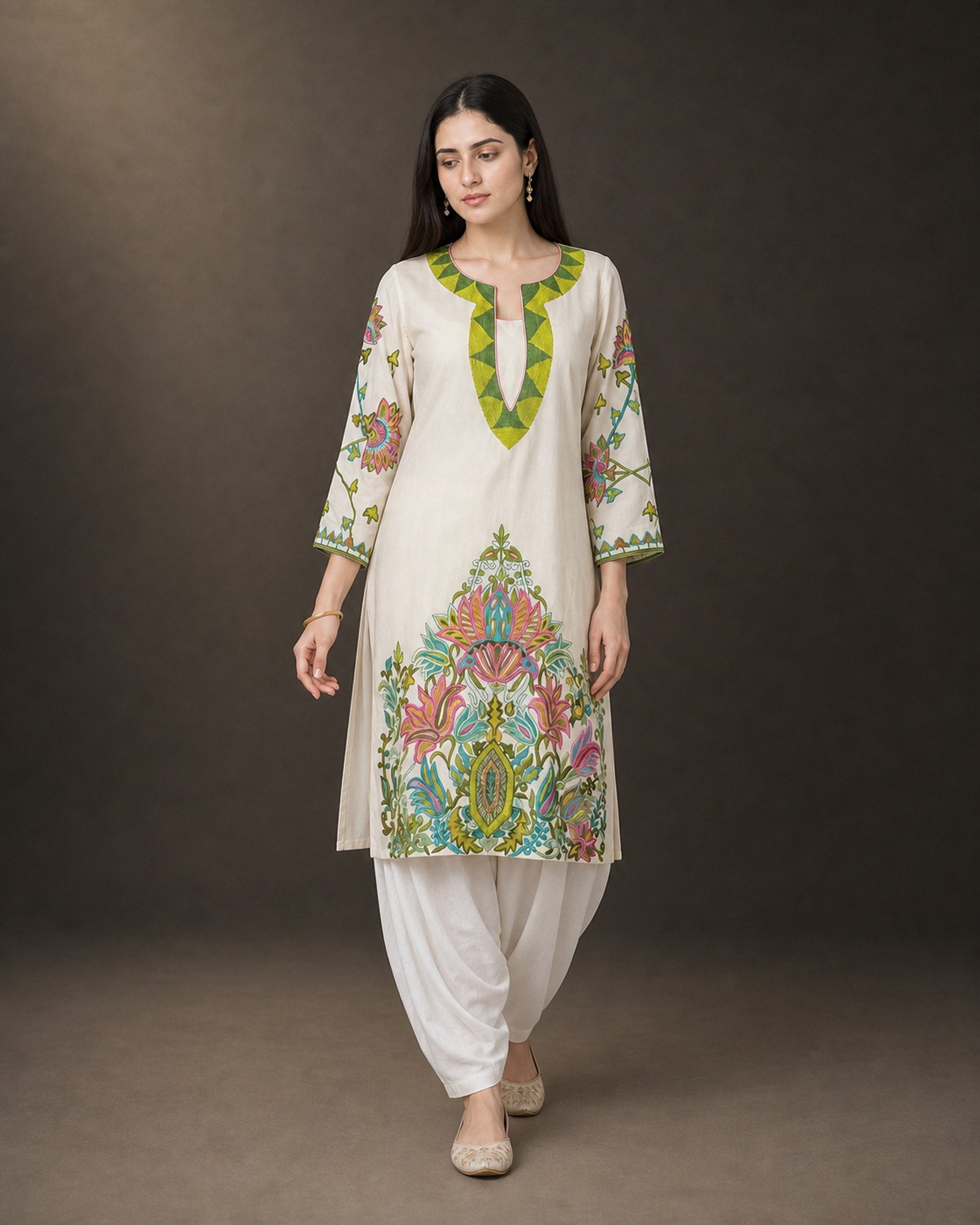Vasantika: Ivory Botanical Embroidered Kurta & Draped Dhoti Set – controlled front walking view