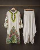 Vasantika: Ivory Botanical Embroidered Kurta & Draped Dhoti Set – refined hanger packshot