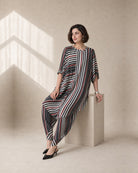 Vayra: Black, White & Red Cowled Stripe Co-ord Set – seated three-quarter