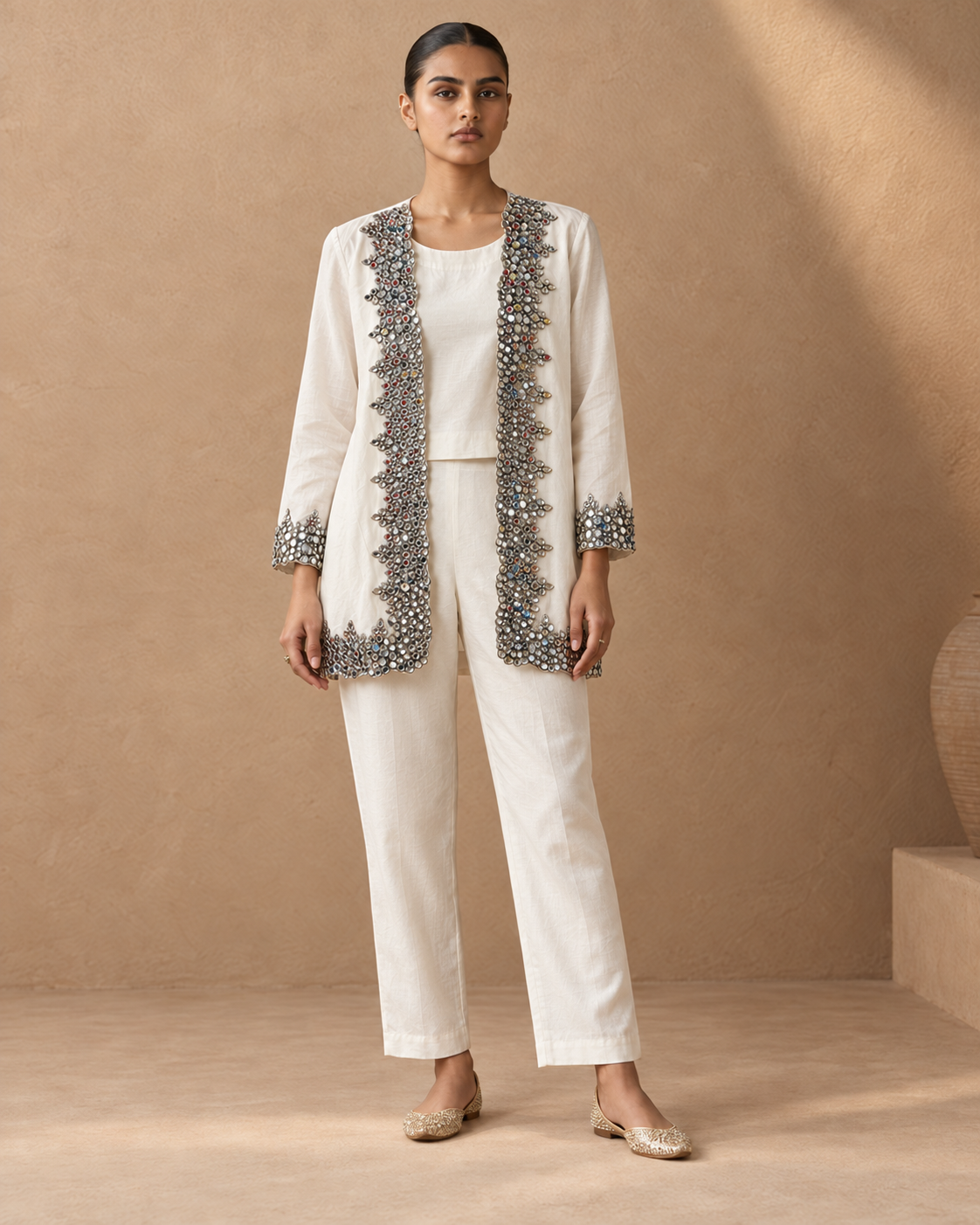 Aaina by House of Somarra — Front view of the ivory three-piece ensemble with embellished open jacket.