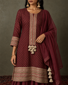 Kyra by House of Somarra — Close-up of the decorative front panel, small motifs and tassels.