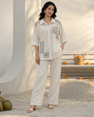 Mihira by House of Somarra — Full-length view of the cream co-ord silhouette and patterned patches.