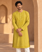 Zarva mustard-yellow striped kurta set — portrait view.